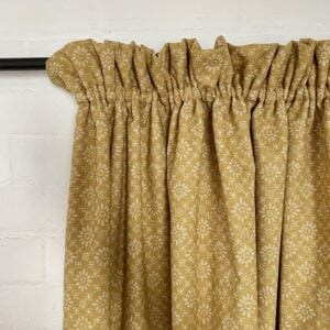 Curtain with a gathered heading