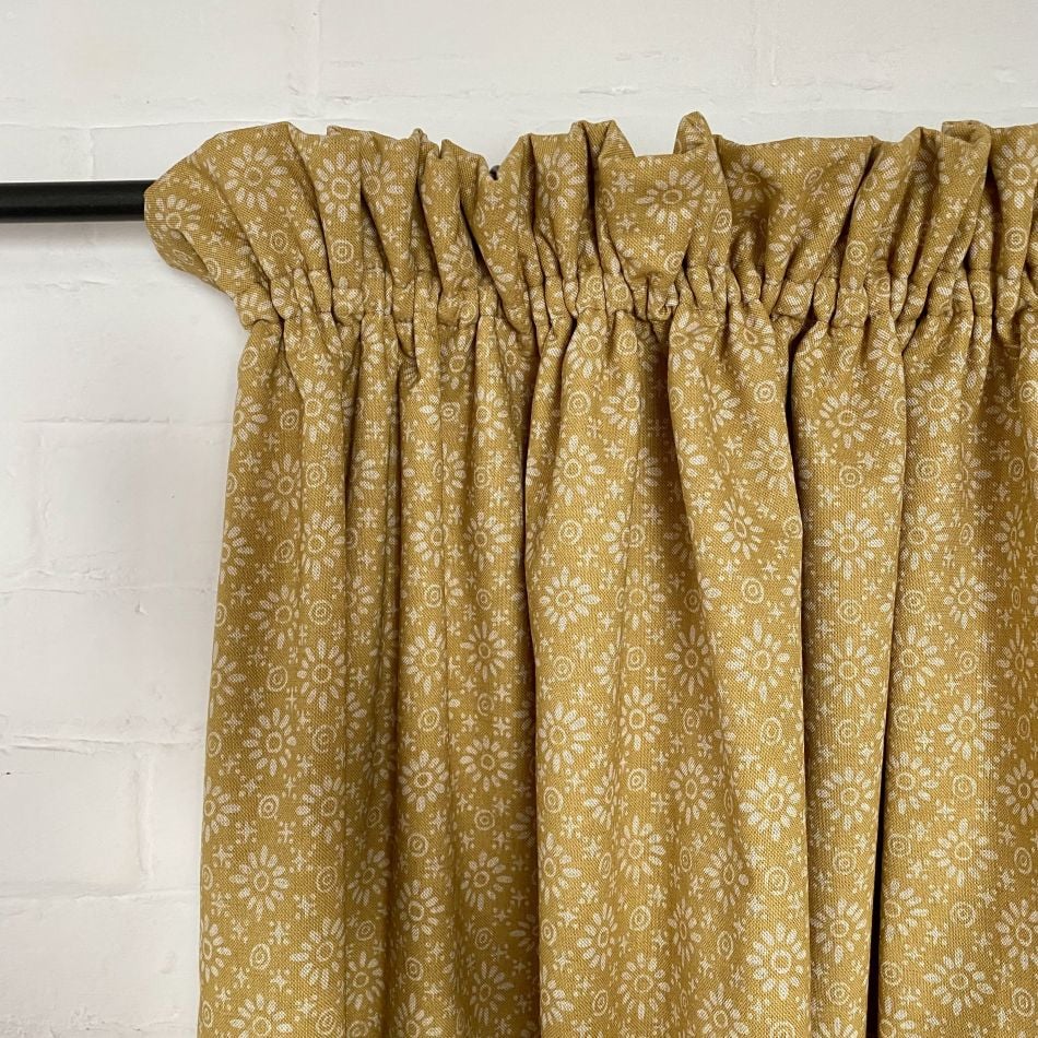 Curtain with a gathered heading