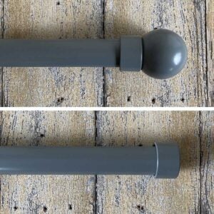 a dark grey curtain track for wide windows