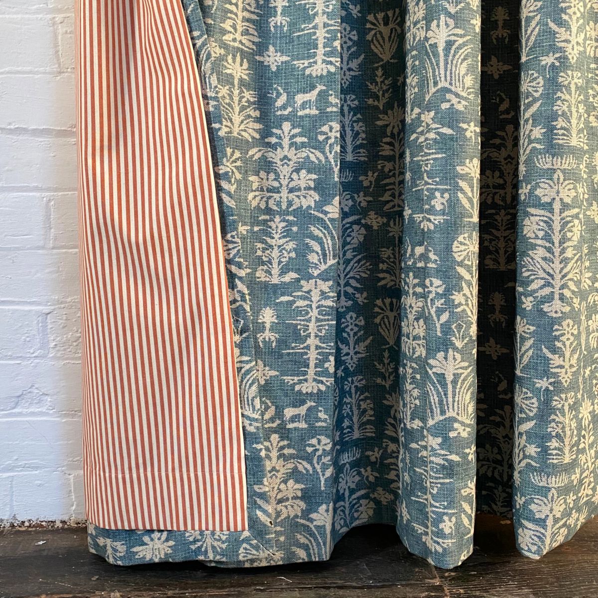 Single curtain in Silvan and Alpha Ticking Stripe fabrics from Tinsmiths Ledbury