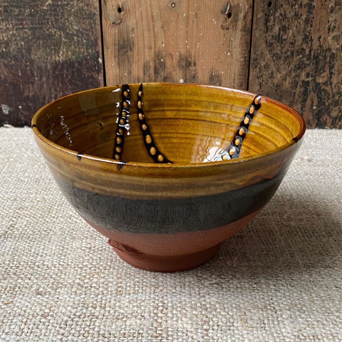 Erica Taylor Low Ceramic deep bowl in an amber glaze