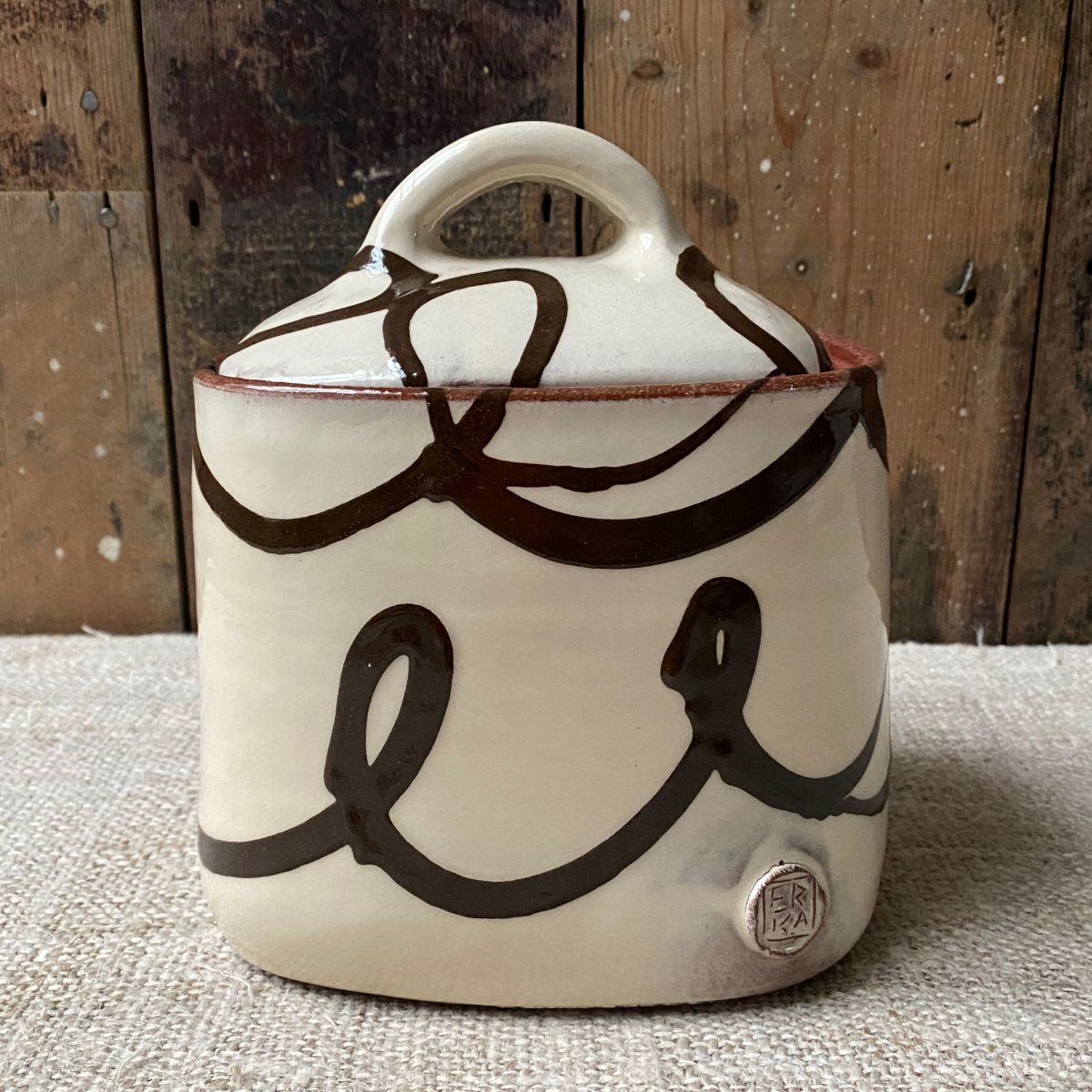 Erica Taylor Low cream slipware jar with lid