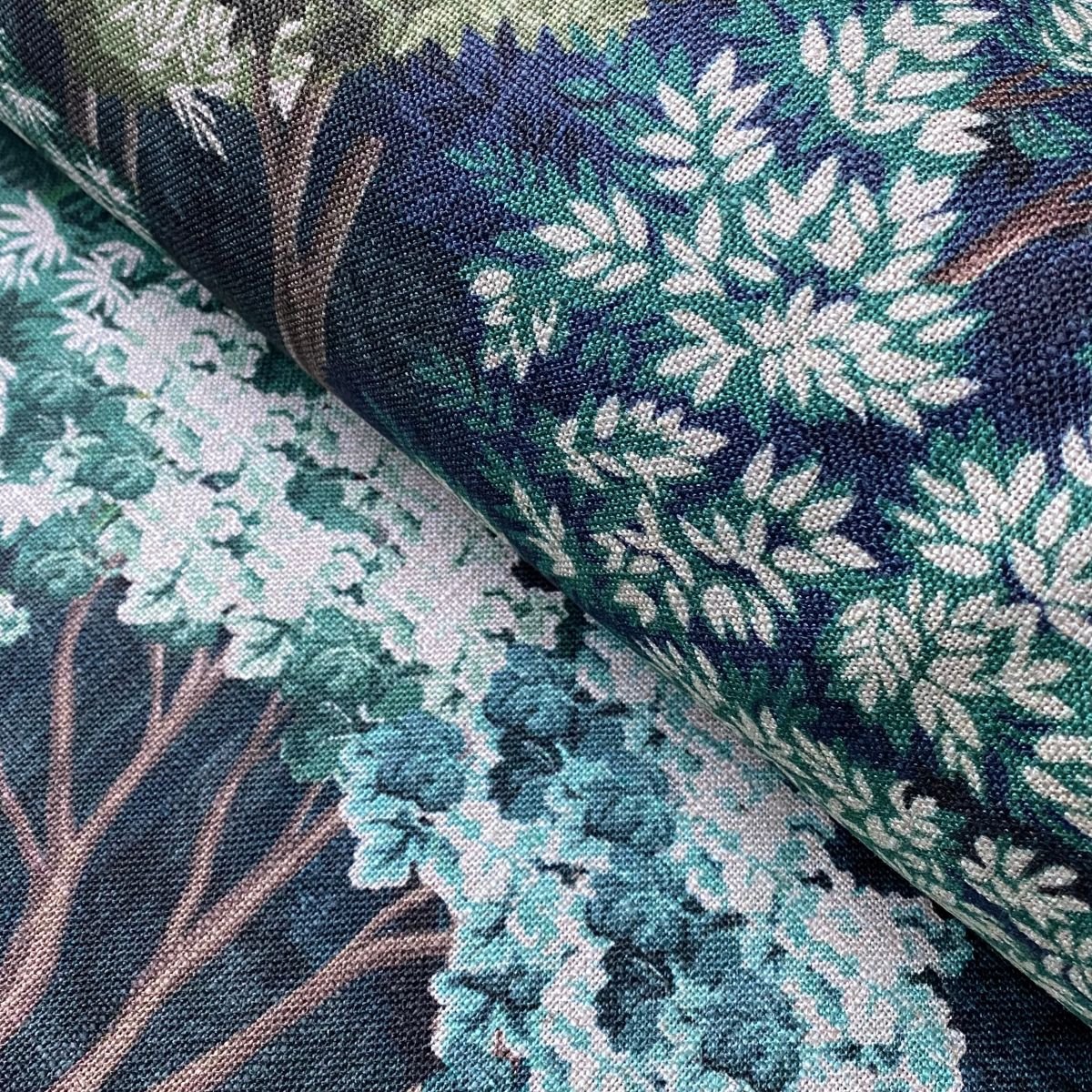 Tinsmiths Extra Wide Arboretum fabric on a roll in Indigo