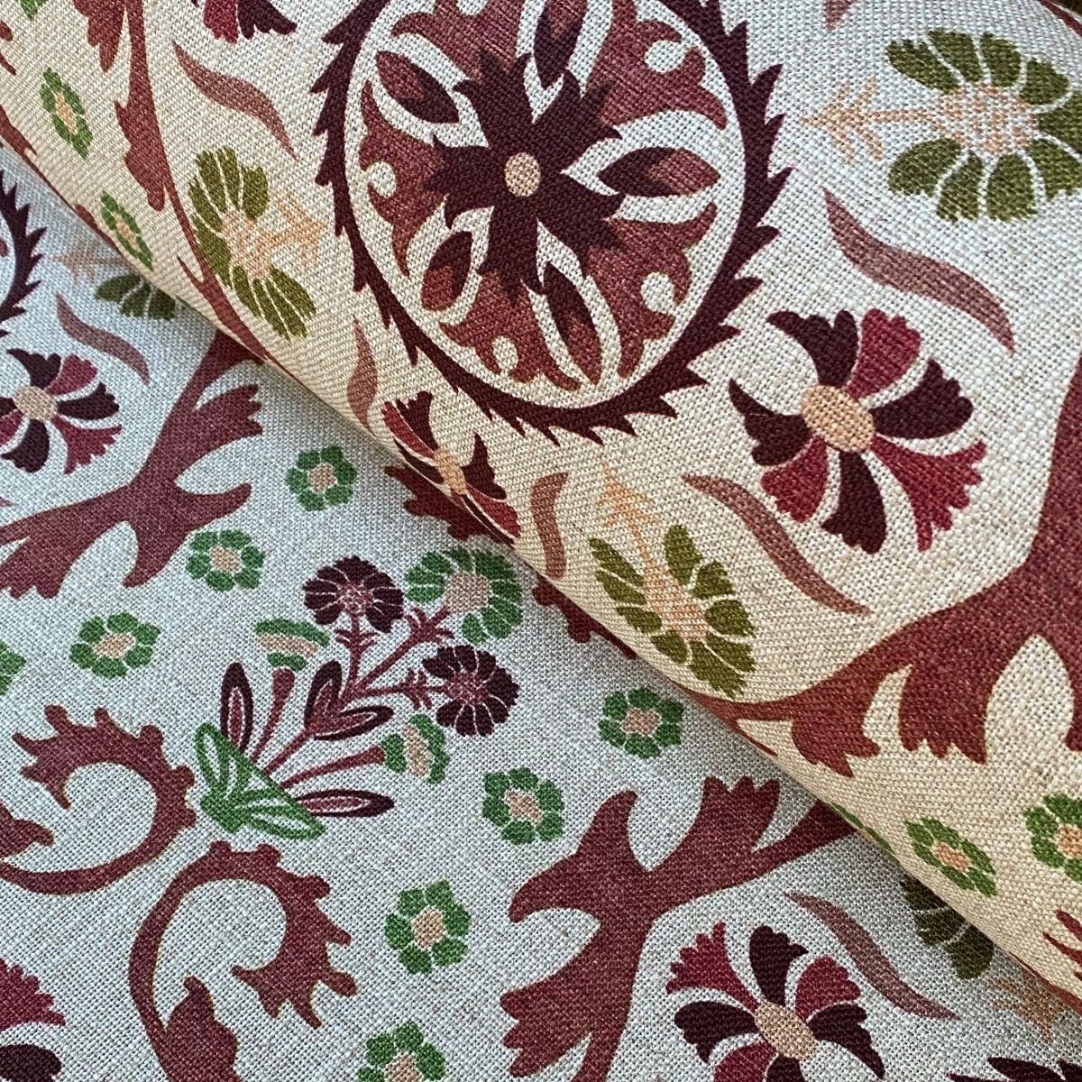 Tinsmiths Extra Wide Suzani print cloth on a roll in Henna Brown & Olive Green