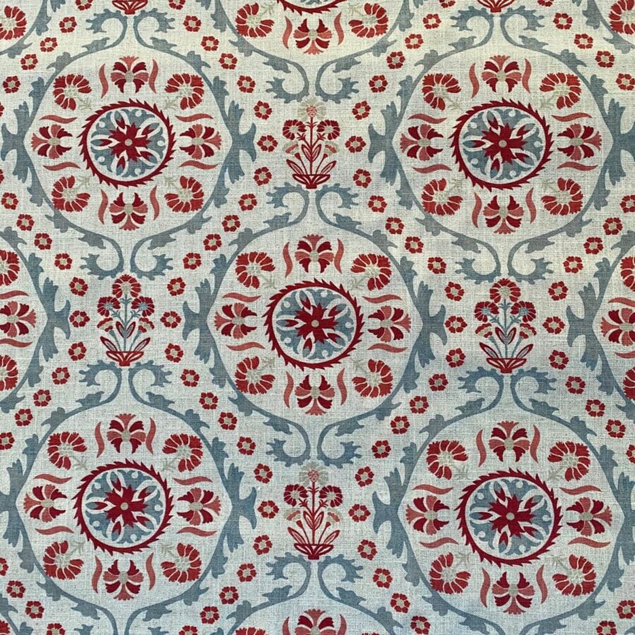 Tinsmiths Extra Wide Suzani print cloth on a roll in Strawberry & Duckegg