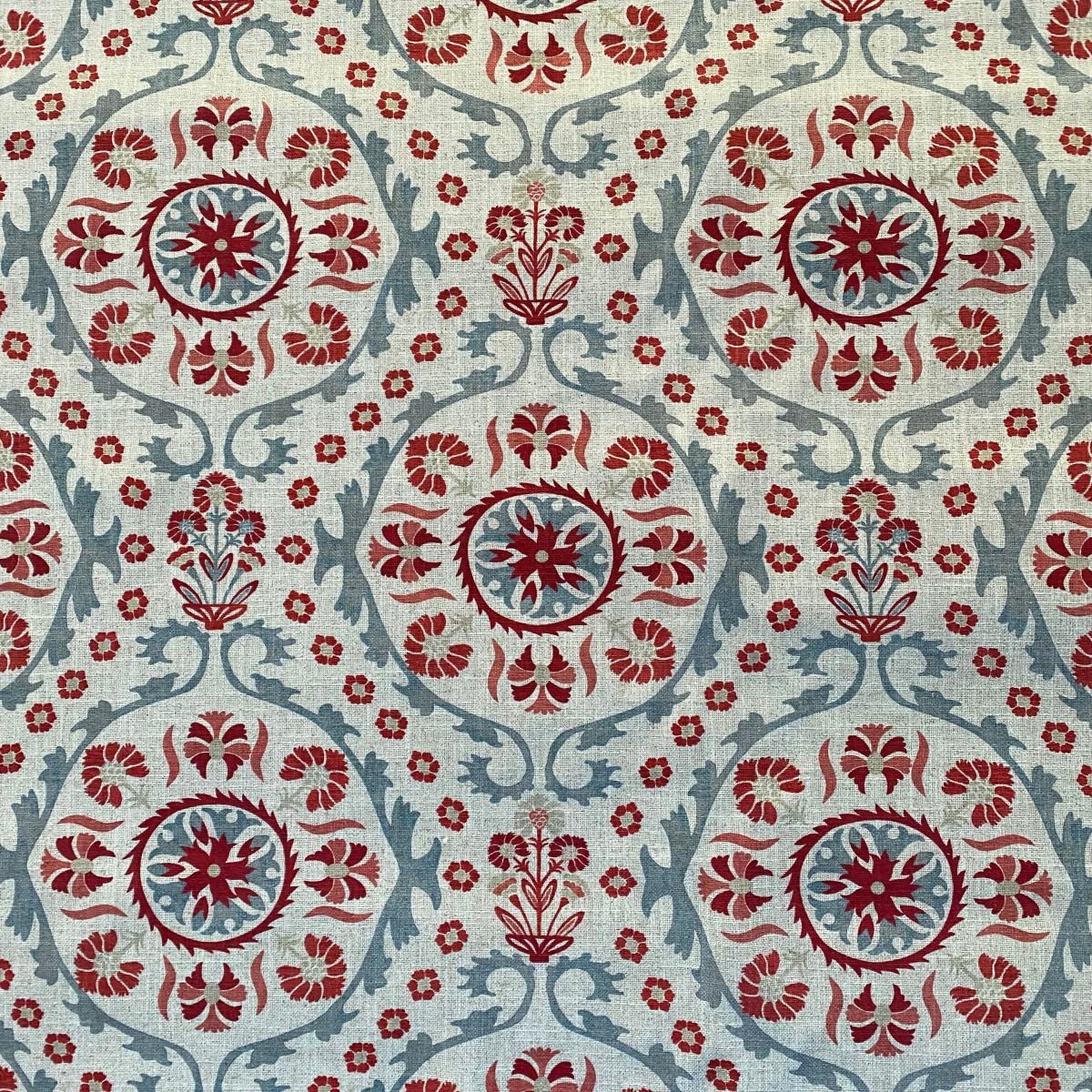 Tinsmiths Extra Wide Suzani print cloth on a roll in Strawberry & Duckegg