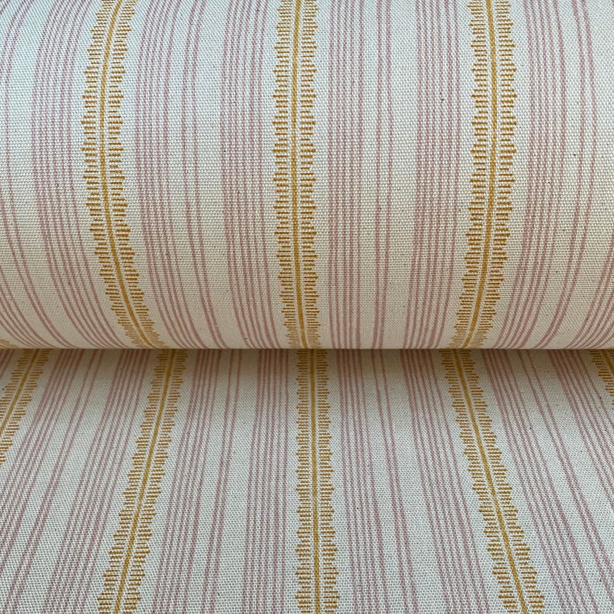 Tinsmiths Striped Feather Stripe Fabric on a roll in carnation pink & orange gold