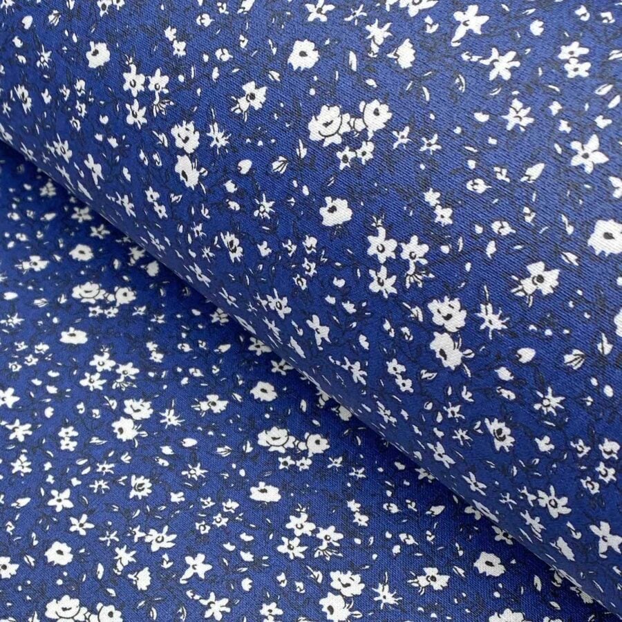 Lenia Lightweight Oilcloth table covering in indigo blue with white flowers
