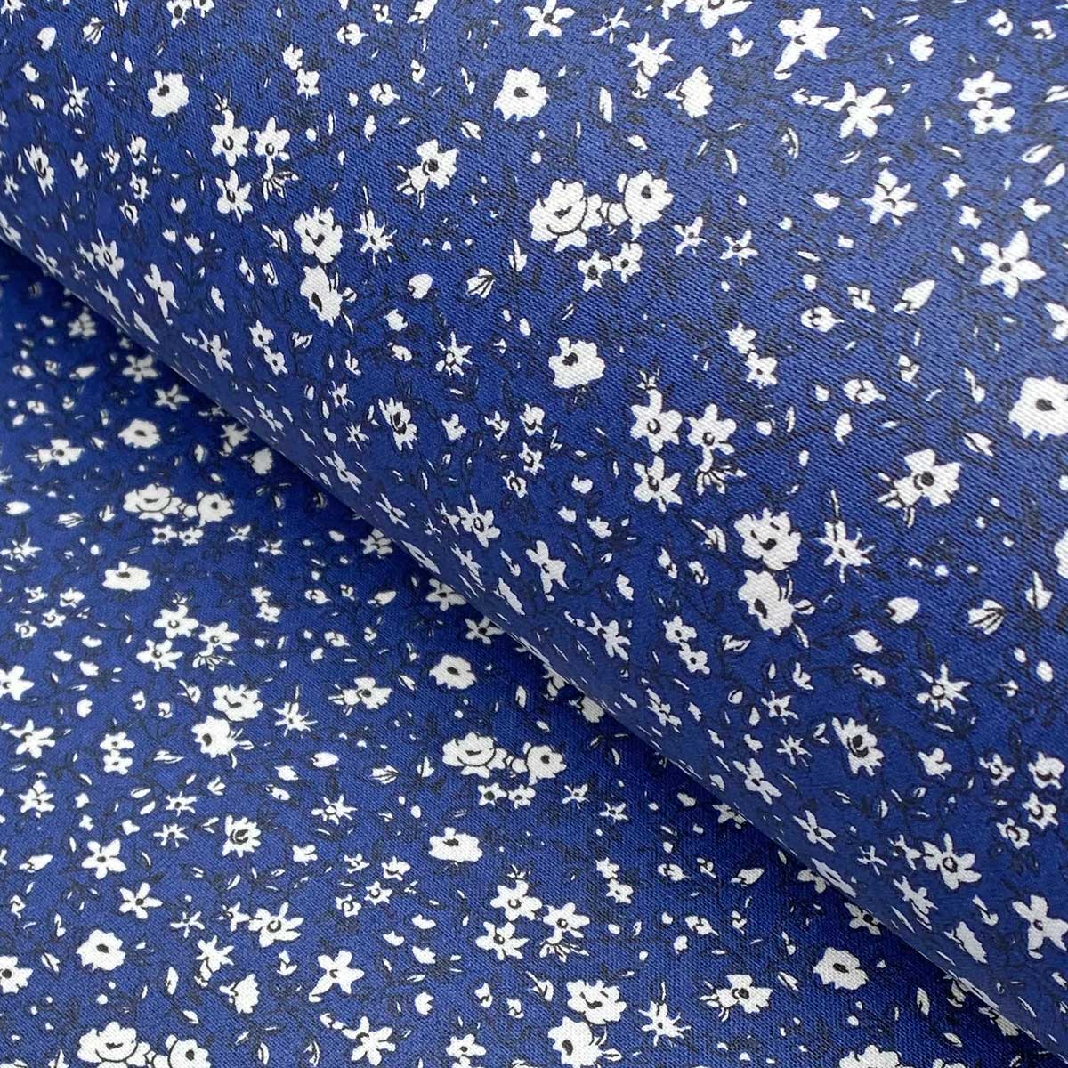 Lenia Lightweight Oilcloth table covering in indigo blue with white flowers