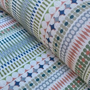 Omega Stripe Blush & Sage Omega Stripe patterned Fabric on a roll from Tinsmiths