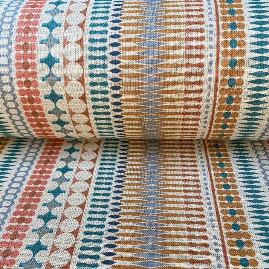 Tinsmiths Omega Stripe patterned fabric roll in teal & orange