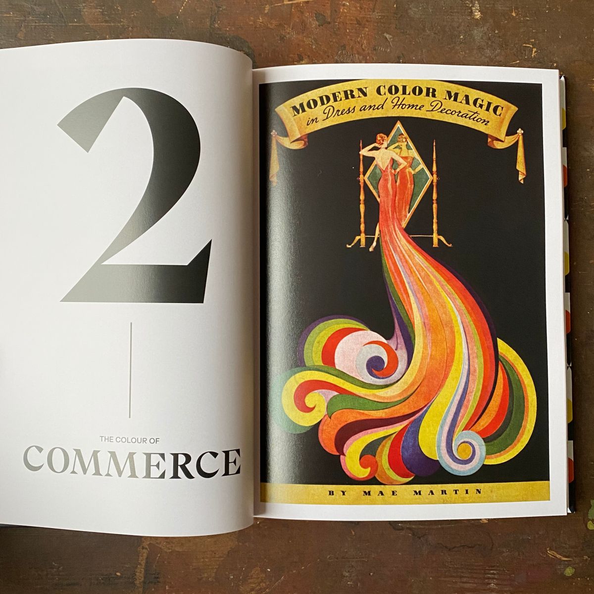 Open book with left page title, Colour in Commerce