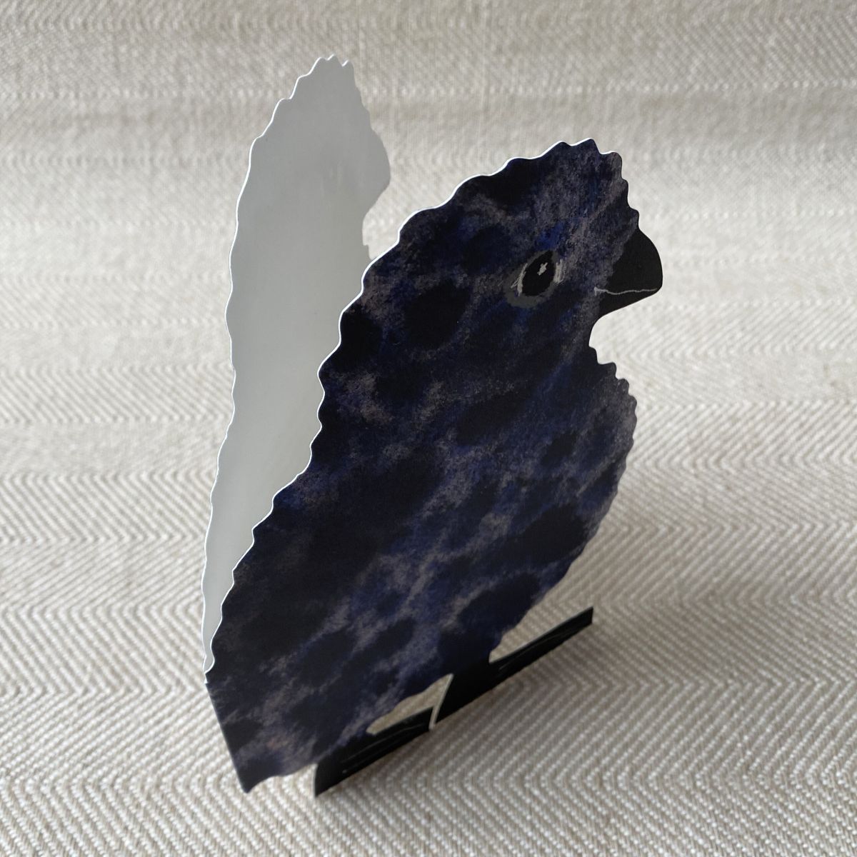Folded greetings card in the shape of a puffling chick