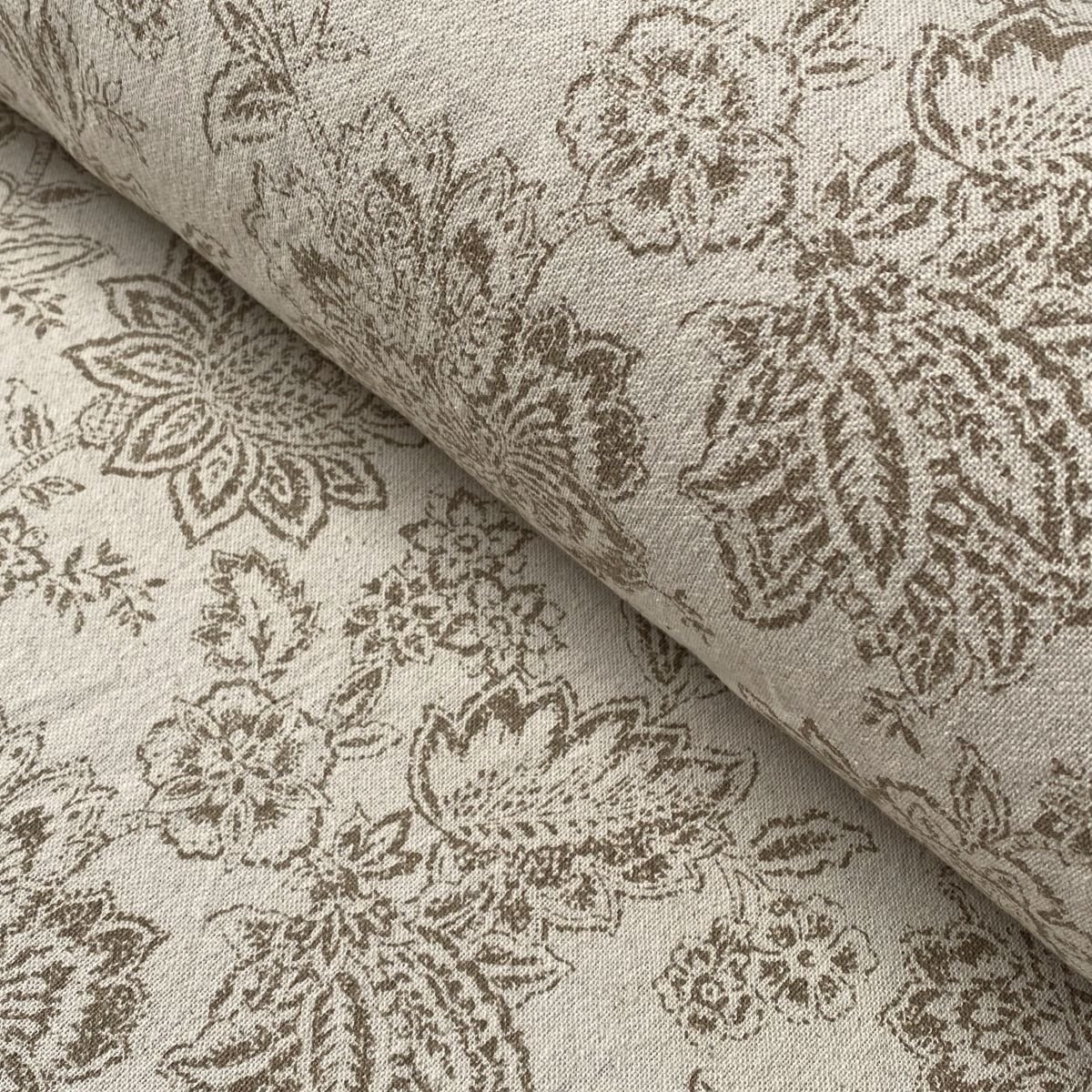 Tree of Life patterned fabric on a slanted roll