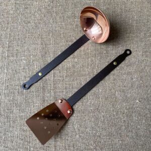 Pair of copper Netherton Foundry copper utensils; ladle and a spatula