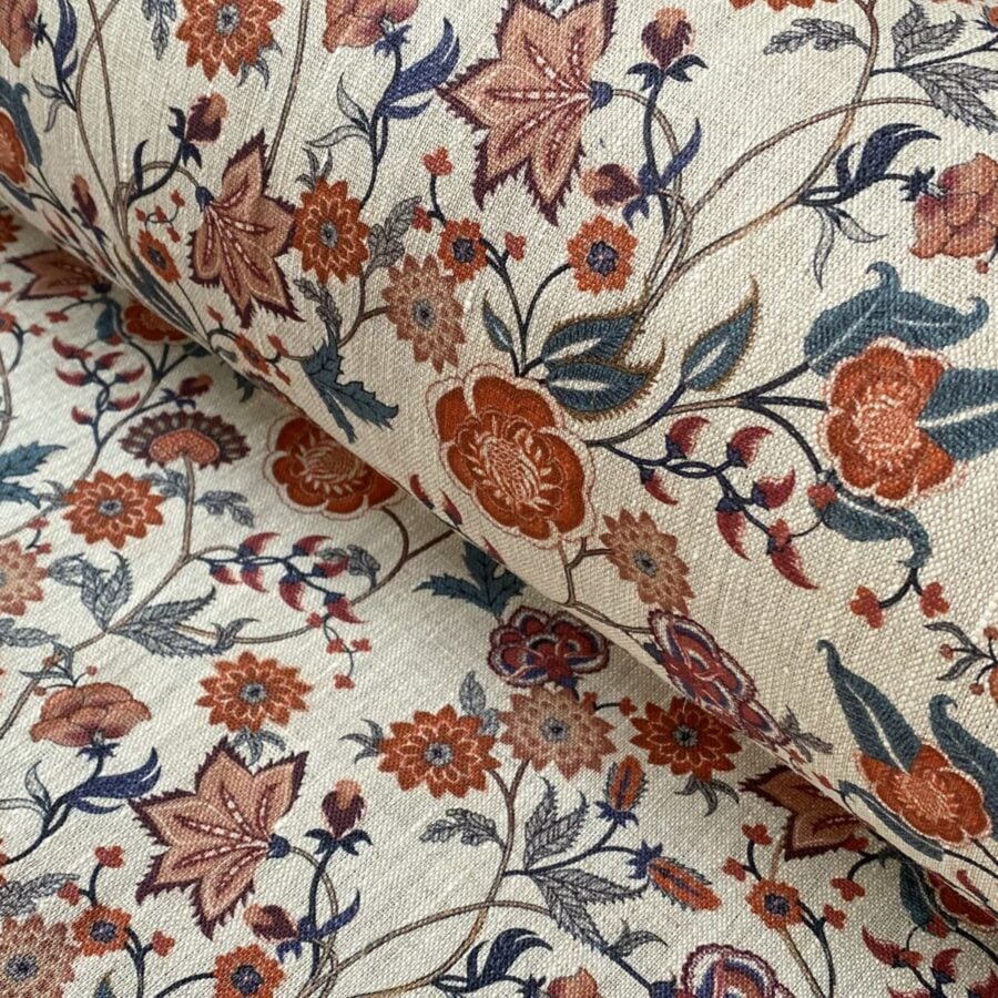 Melody Linen Print fabric in teal & orange on a roll