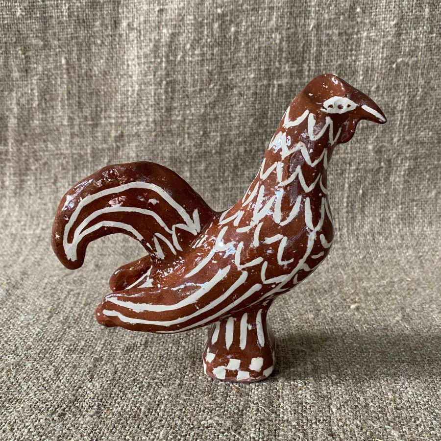 Emma Carlow Upright Cockerel clay whistle on cloth background