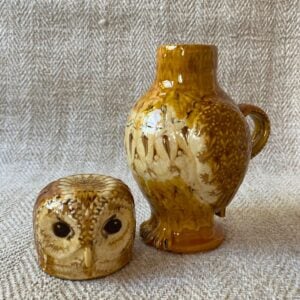 Pottery jug in shape of an ow, with a removable head