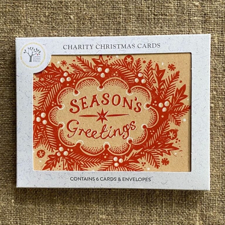 Christmas Card pack on fabric background