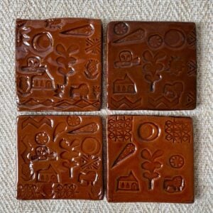 Desdemona McCannon glazed stamped tiles