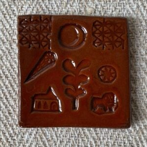 Desdemona McCannon glazed stamped tiles