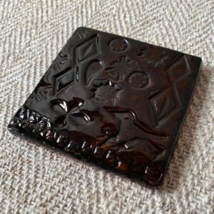 Desdemona McCannon glazed stamped tiles