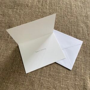 Christmas Card pack on fabric background