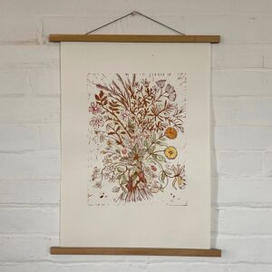 Jen Whiskerd linocut print on a white wall