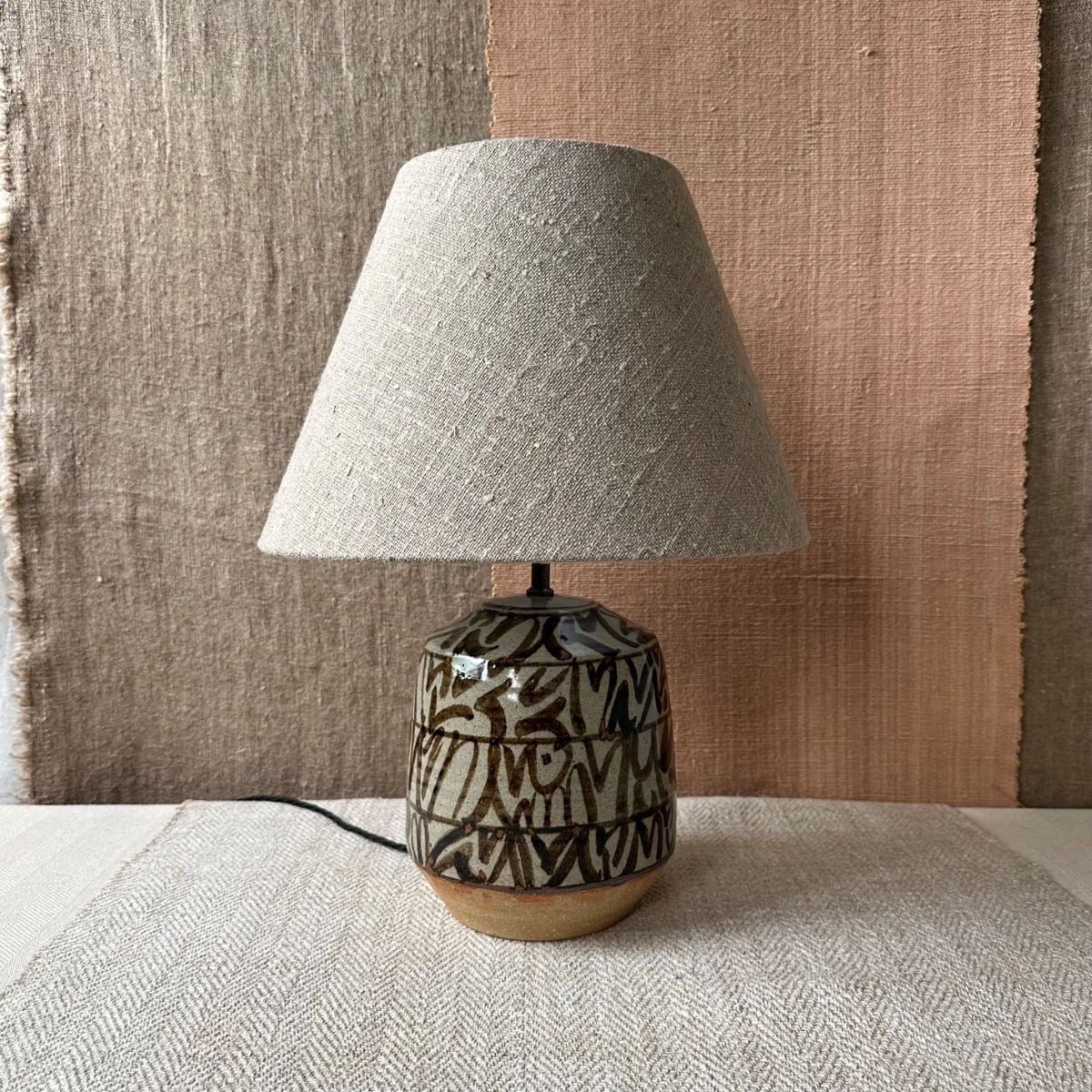 pottery lamp base with natural linen shade