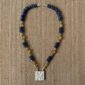Silver Hawk necklace with blue and amber beads
