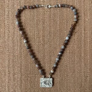 Silver boar pendant with agate necklace