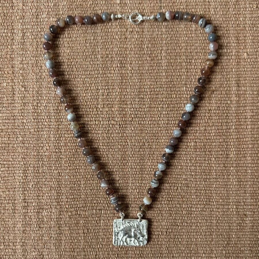 Silver boar pendant with agate necklace