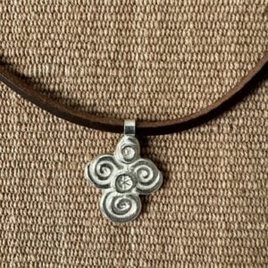 Silver scroll thong necklace