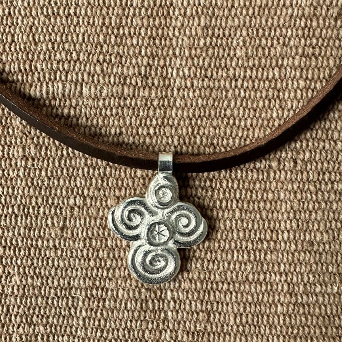 Silver scroll thong necklace