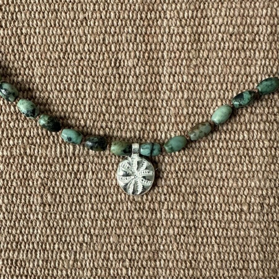 Primitive cross and turquoise necklace