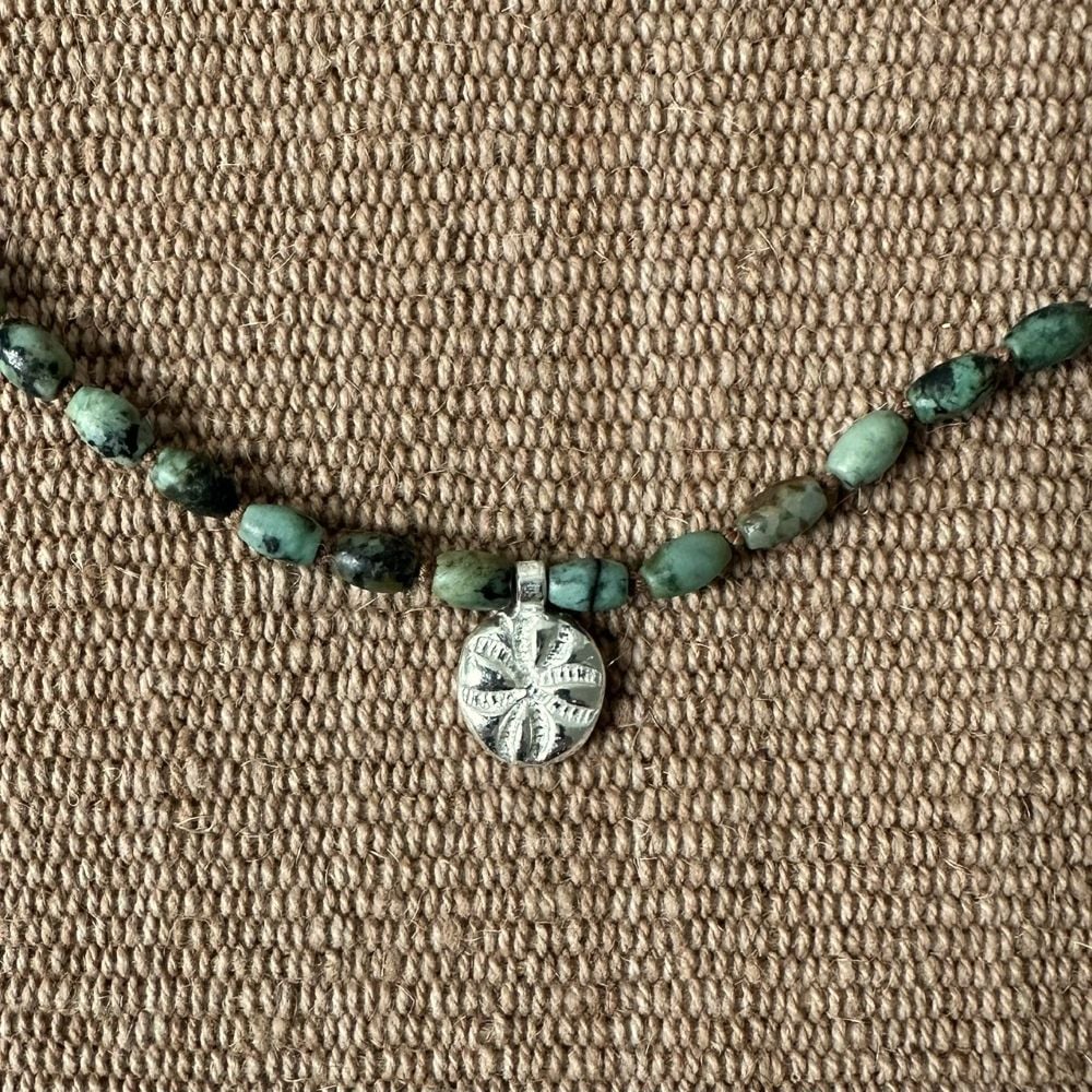 Primitive cross and turquoise necklace