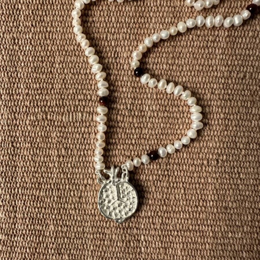 A seed pearl and red tigers eye necklace with