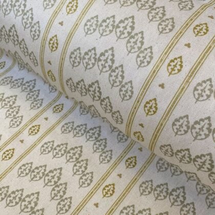 Striped pattern fabric on a slant with a repeated tree design in flax and yellow
