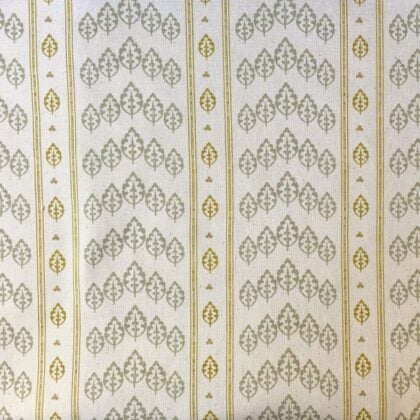 Striped pattern fabric on a slant with a repeated tree design in flax and yellow