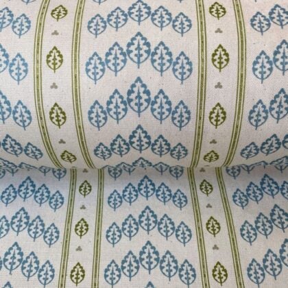 Striped pattern fabric with a repeated tree design in blue and olive green