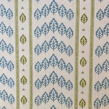 Striped pattern fabric with a repeated tree design in blue and olive green