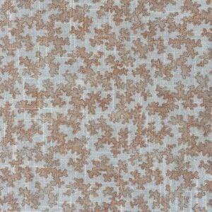 Slanted roll of fabric featuring a small scale coral design in pink