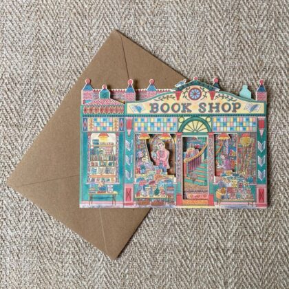 3D upright card of a book shop illustrated by Emily Sutton against a pale fabric background