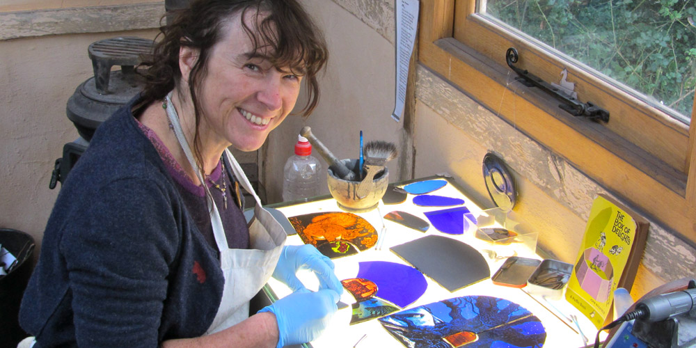 Tamsin Abbott at work Stained Glass Tinsmiths 
