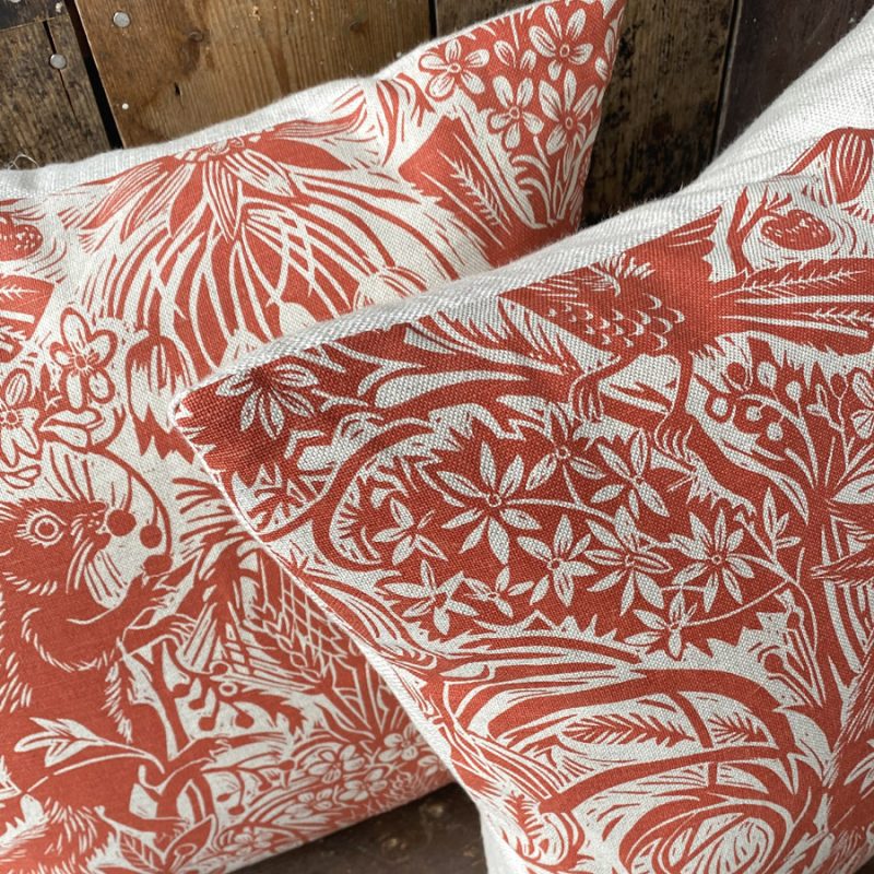 SQUIRREL AND SUNFLOWER CUSHION - BRICK RED - Image 2